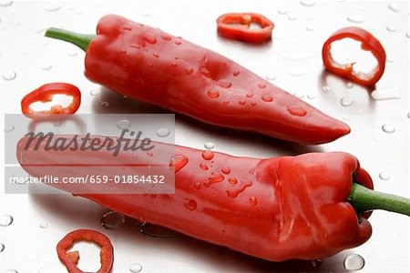 Two red pointed peppers