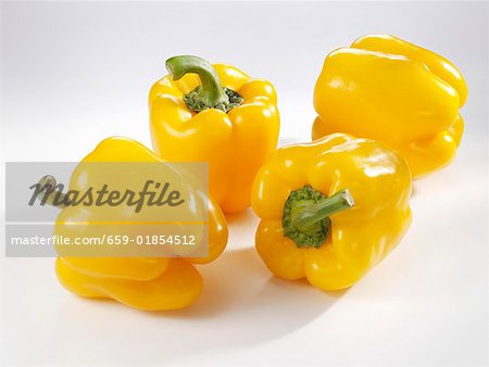 Four yellow peppers Four yellow peppers