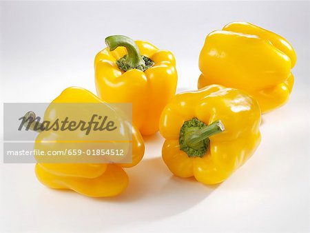 Four yellow peppers