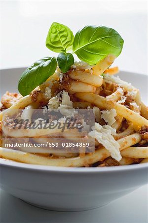 Macaroni with mince sauce and cheese