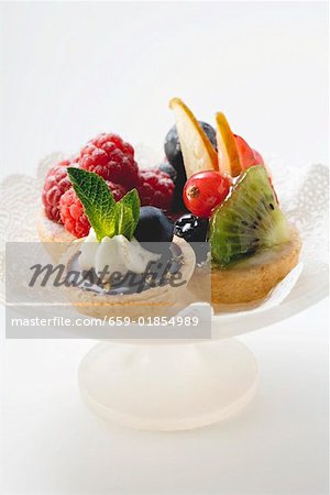 Fruit tarts on a pedestal cake stand