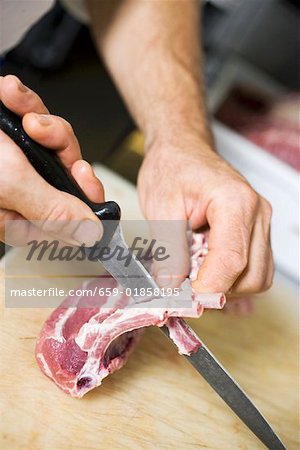 Trimming lamb cutlets