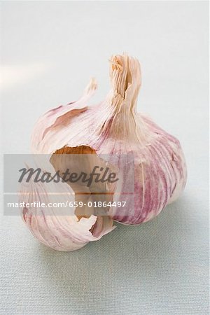 Garlic bulb with a clove separated