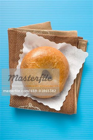 Bagel on paper napkin