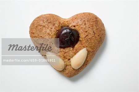 Gingerbread heart with almonds
