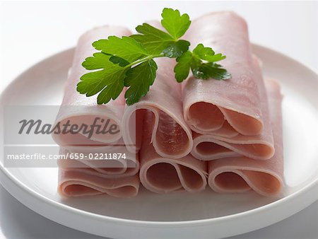 Ham rolls garnished with parsley