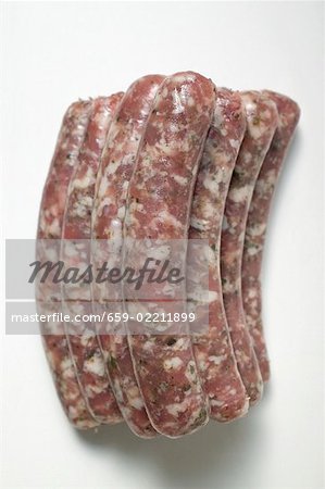 Raw sausages, in a pile (overhead view)