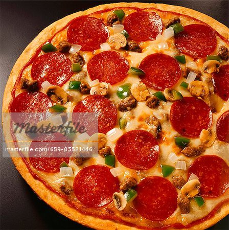 Pizza with Pepperoni, Sausage and Vegetables