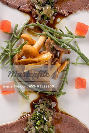 Garnish of chanterelles and samphire