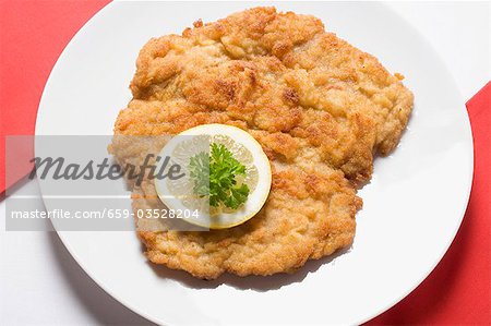 Wiener schnitzel (veal escalope) with lemon slice & parsley