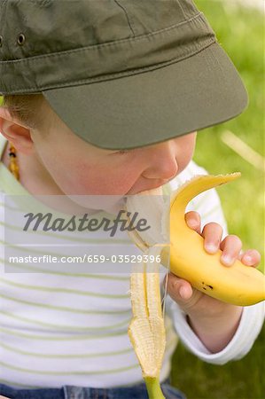 Baby eating a banana