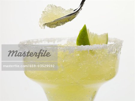 Frozen Margarita in glass and on spoon