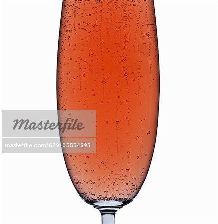 A glass of rosÈ sparkling wine (detail)
