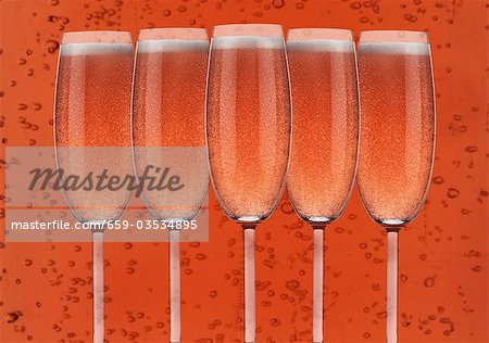 Several glasses of rosÈ sparkling wine