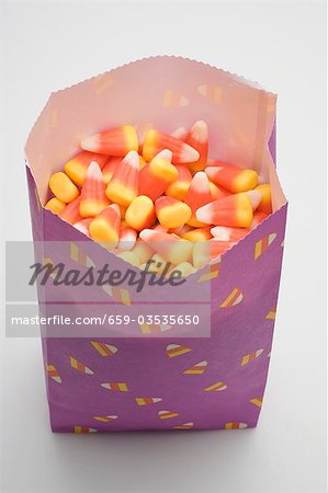 Candy corn in paper bag