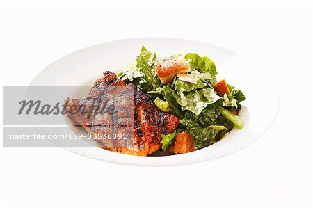 Caesar salad with grilled salmon