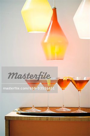 Cocktails on a Tray Under Lights