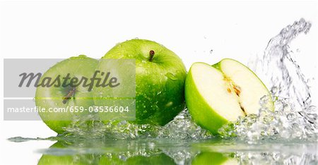 Fresh green apple with water Stock Photos - Page 1 : Masterfile