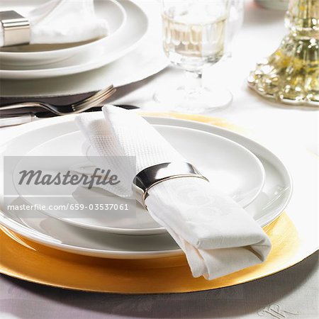 Festive place-setting with fabric napkin