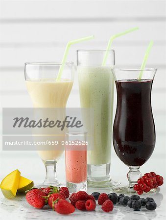Various smoothies and fresh fruit