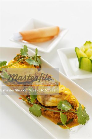 Steamed monk fish with curry sauce, jasmin rice and coriander (Asia)