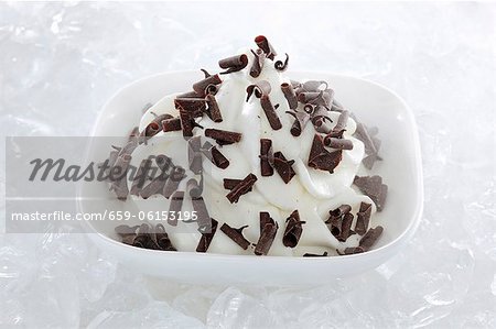 Yogurt ice cream garnished chocolate curls