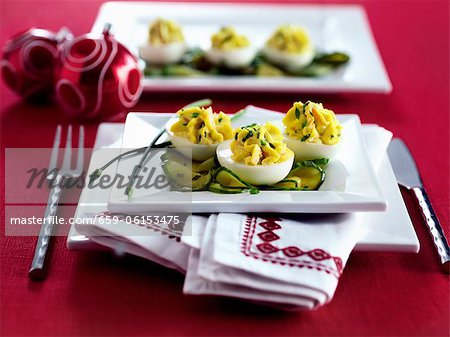 Devilled eggs on cucumber slices