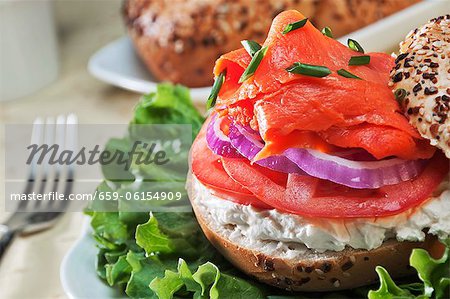 Smoked Salmon on a Bagel with Cream Cheese, Onions and Tomato