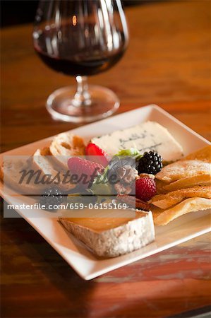 Cheese Plate with a Glass of Red Wine