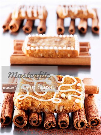 French 'pepper nut' biscuits on cinnamon sticks