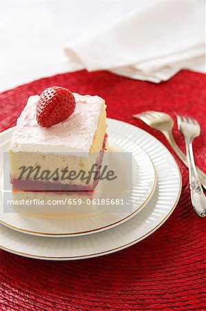 Piece of Tres Leches Cake with a Strawberry Layer; Two Forks