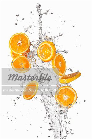 Orange slices and a splash of water Orange slices and a splash of water