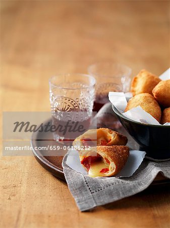 Panzerotti (deep-fried Italian dough parcels) with provolone