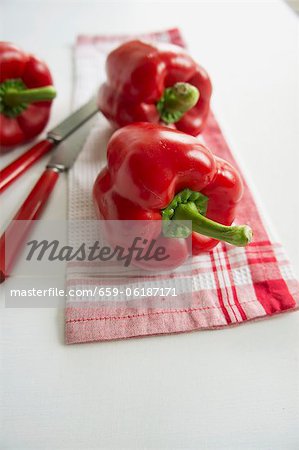 Red peppers on a tea towel