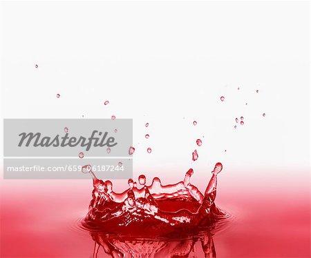 Download A Splash Of Raspberry Juice Stock Photo Masterfile Premium Royalty Free Code 659 06187244 PSD Mockup Templates