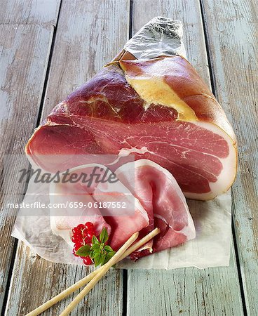 Cut, air-cured ham and grissini