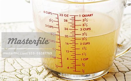 2 1/2 Cups of Chicken Broth in a Measuring Cup - Stock Photo - Masterfile -  Premium Royalty-Free, Code: 659-06187769