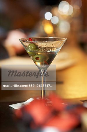 Partially Drank Martini with Olives Partially Drank Martini with Olives