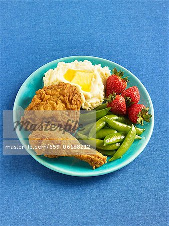 Fried Chicken with Mashed Potatoes, Strawberries and Snap Peas