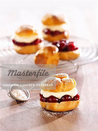 Profiteroles filled with cherries and cream