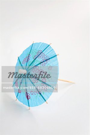 A blue cocktail umbrella