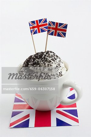 A cupcake with cream and Union Jacks