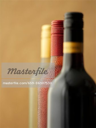 Three bottles of wine: red wine, rose wine and white wine Three bottles of wine: red wine, rose wine and white wine