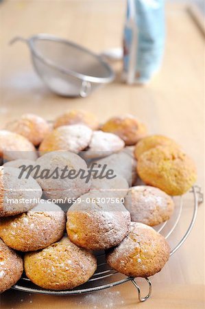 Home-made pumpkin biscuits on a wire rack