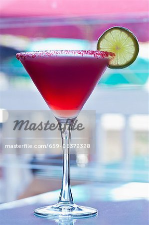 Hibiscus Infused Tequila Margarita with Sugared Rim and Lime Garnish Hibiscus Infused Tequila Margarita with Sugared Rim and Lime Garnish