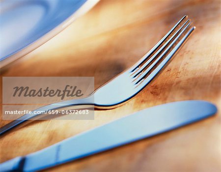 Cutlery on a wooden surface