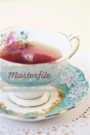 Cup of Tea in a Pretty Tea Cup Cup of Tea in a Pretty Tea Cup