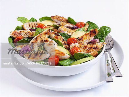 Grilled chicken salad with spinach and tomatoes