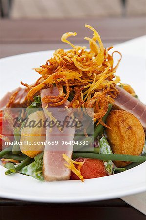 Roast potato, fried tuna, green beans and braised tomato salad