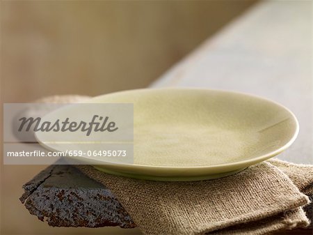 A plate on a linen cloth A plate on a linen cloth